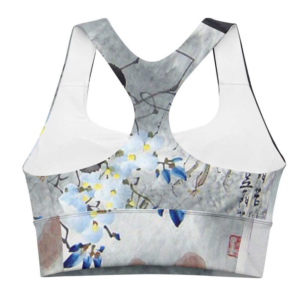 Flat lay back view of Japanese art printed Babe Dept sports bra with black trim.