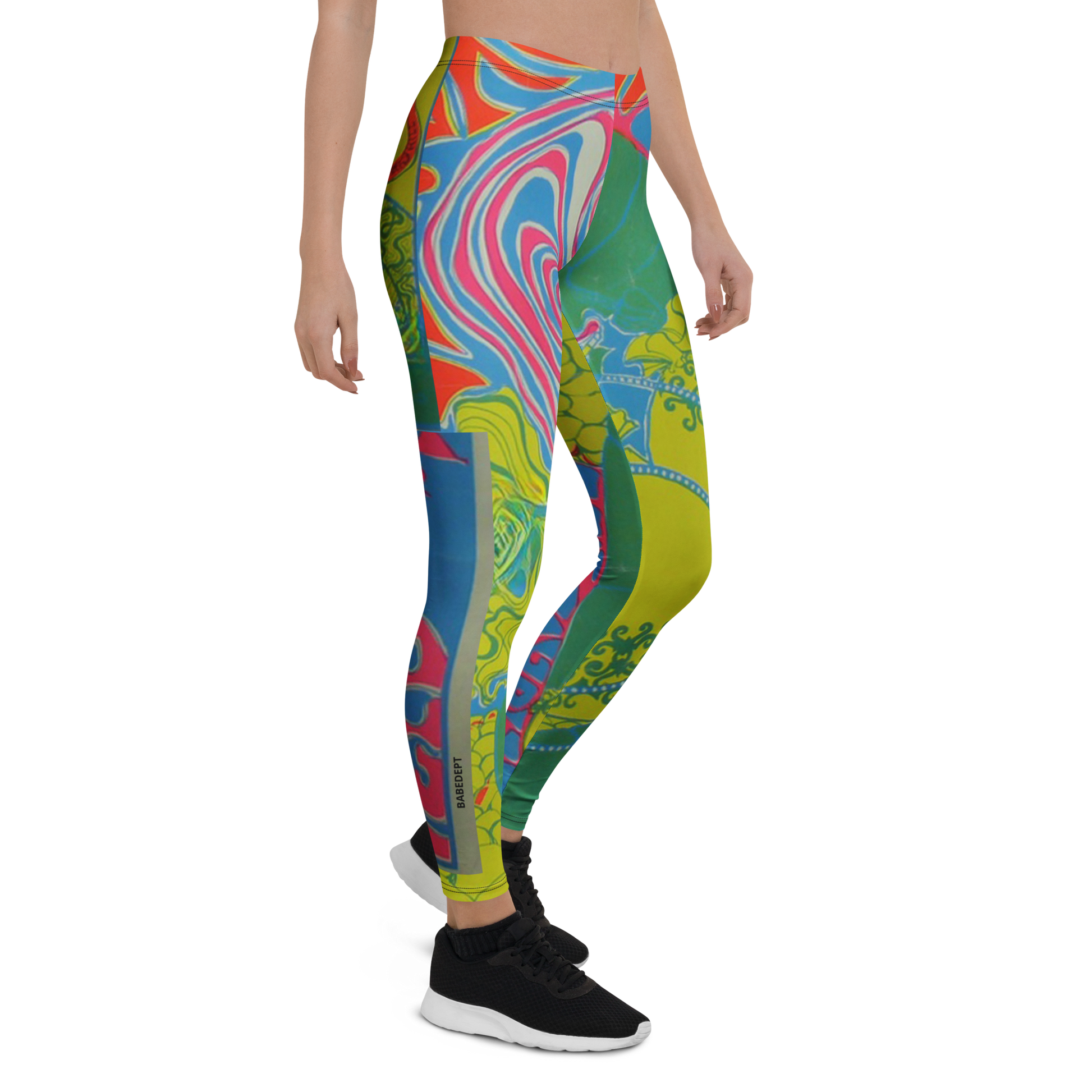 Front side angle of BabeDept psychedelic leggings with bright swirling patterns and neon details