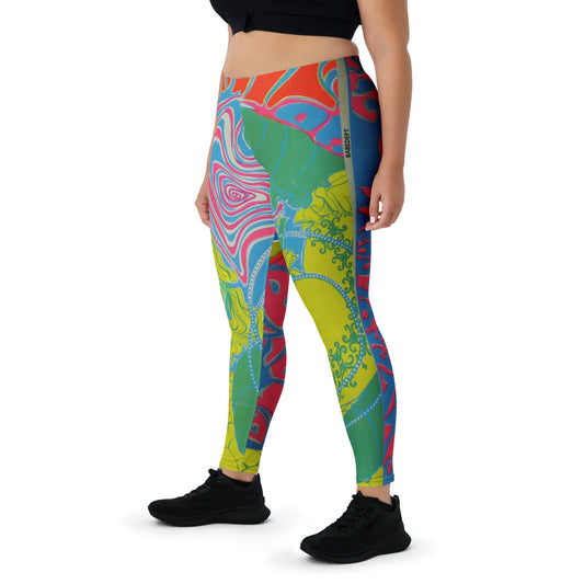 Model wearing Babe Dept colorful yoga leggings with psychedelic swirl design, side front view.