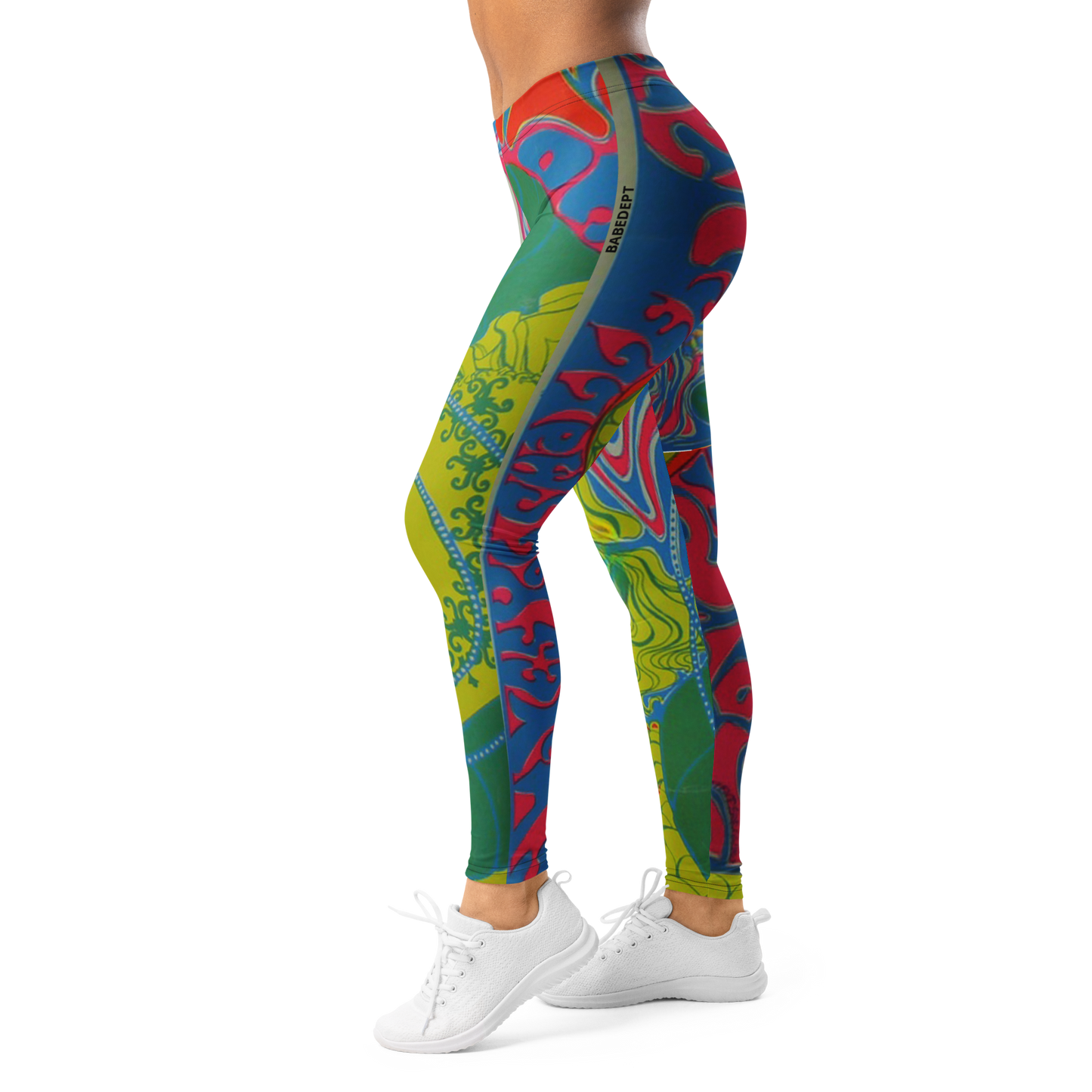 Side angle of BabeDept psychedelic leggings with neon abstract patterns on model