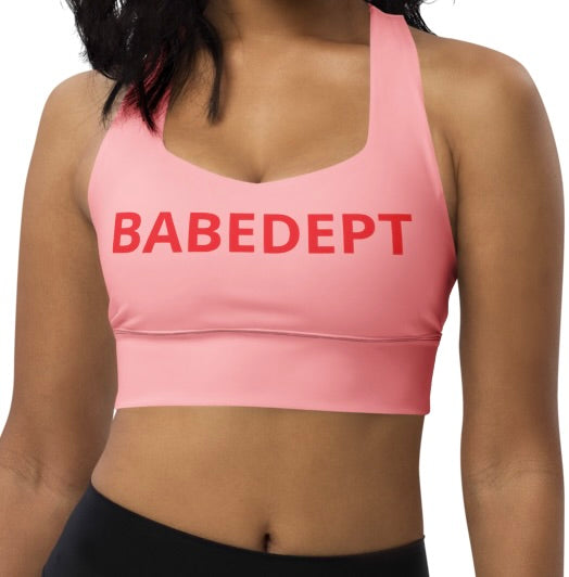 Front view of pink BABEDEPT longline sports bra with red logo